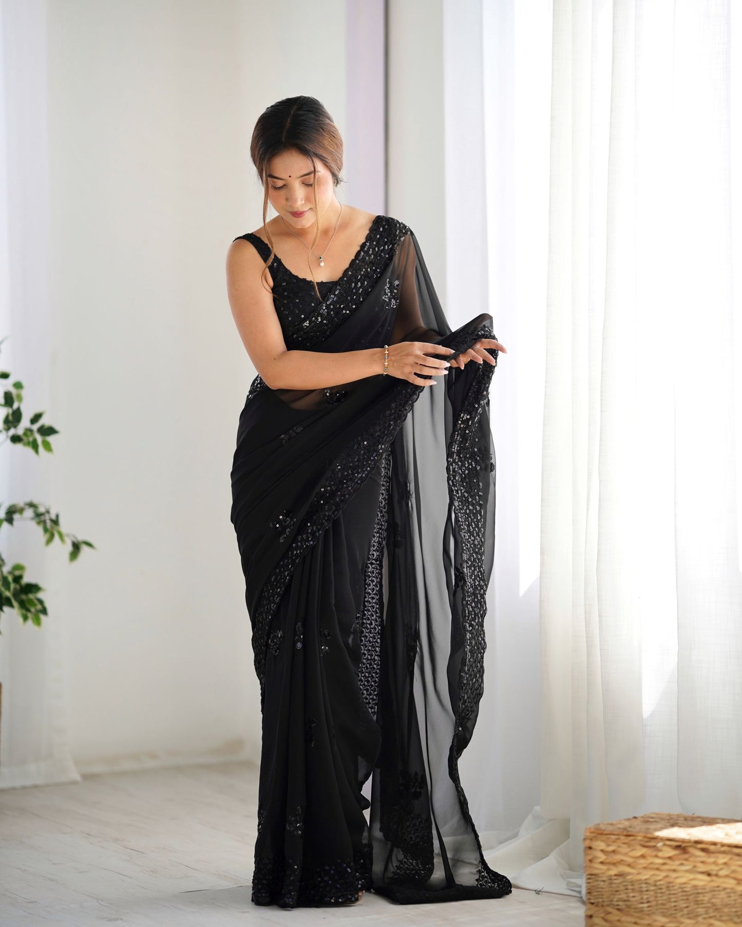 Elegant Georgette Party Wear Black Saree with Thread & Sequence Work