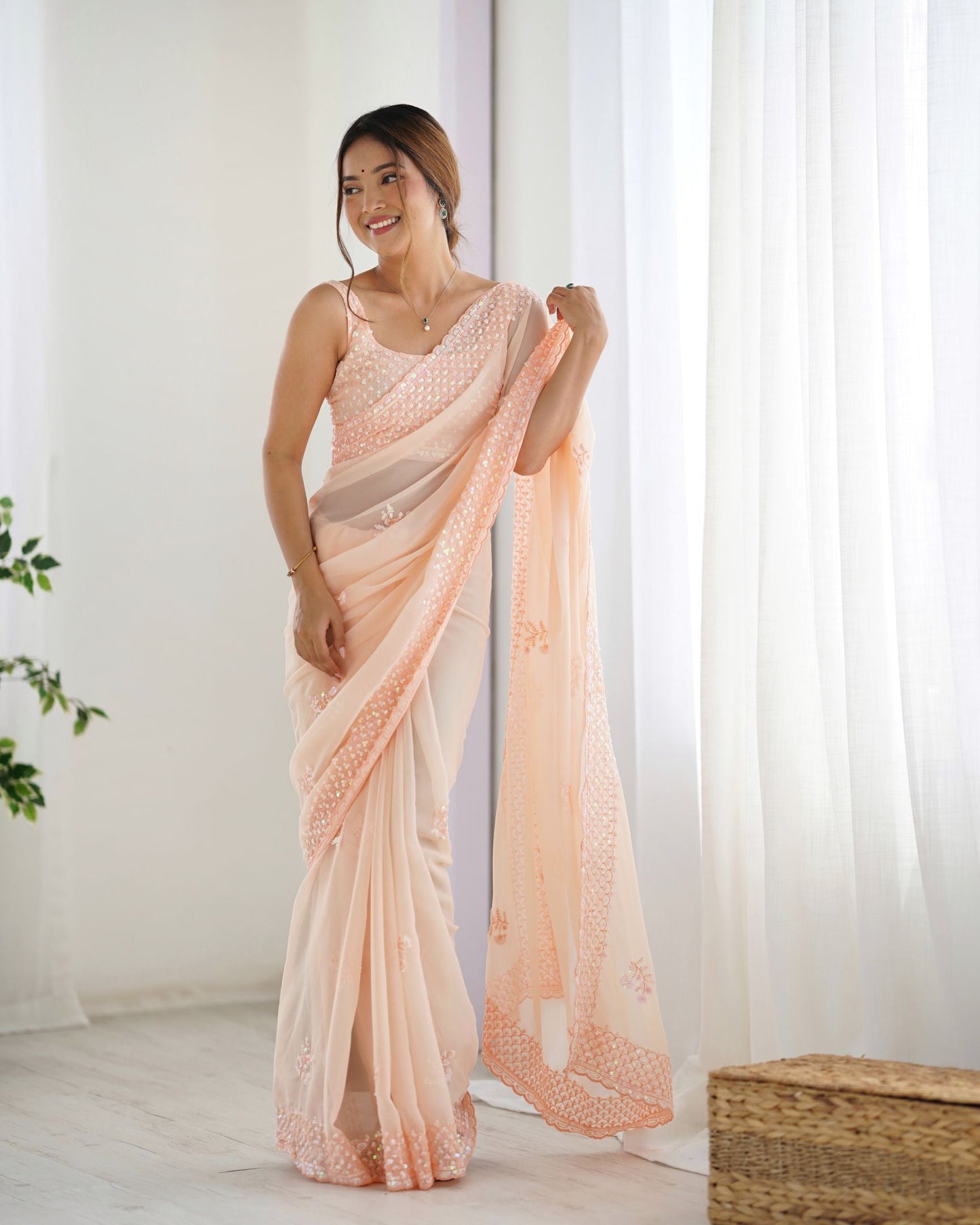 Beautiful Peach Georgette Party Wear Saree with Thread & Sequence Work