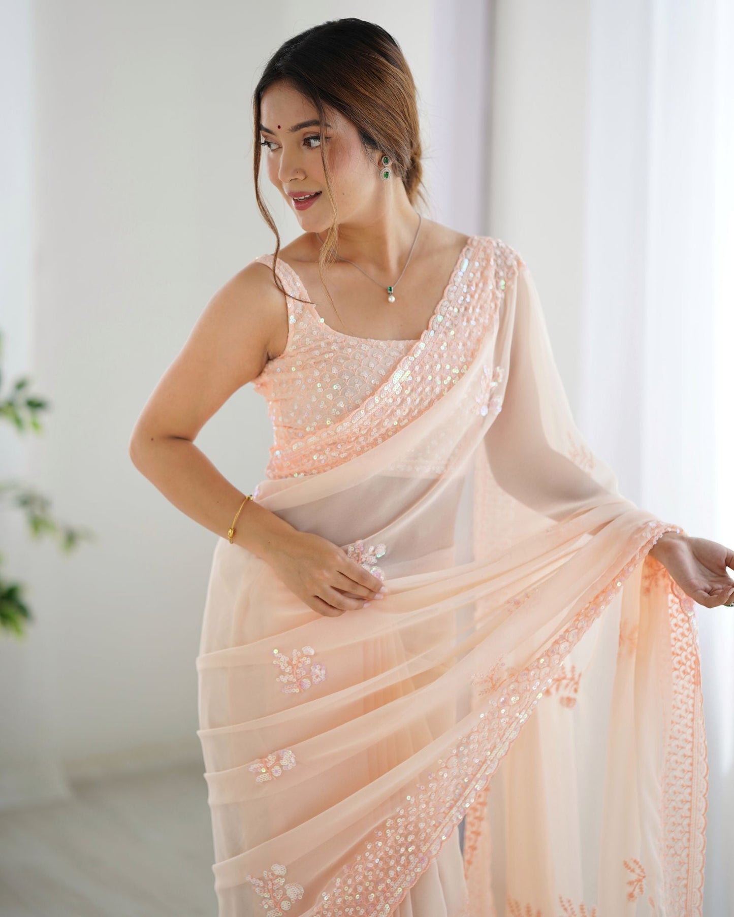Beautiful Peach Georgette Party Wear Saree with Thread & Sequence Work