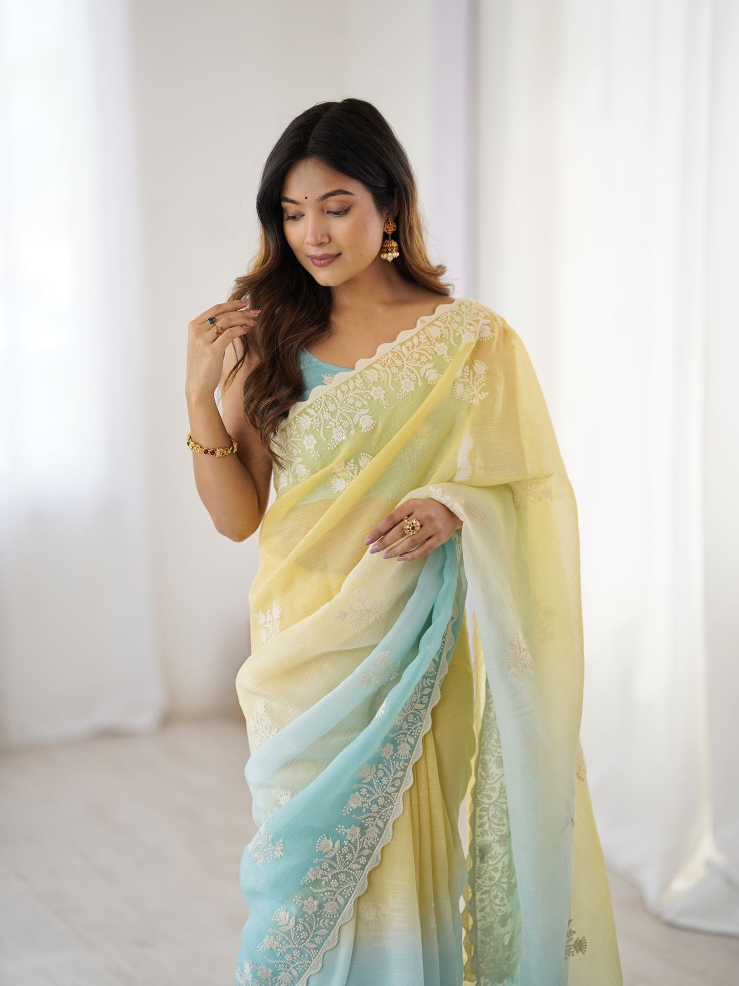 Yellow Crunchy Silk Party Wear Saree with Sea Green Blouse